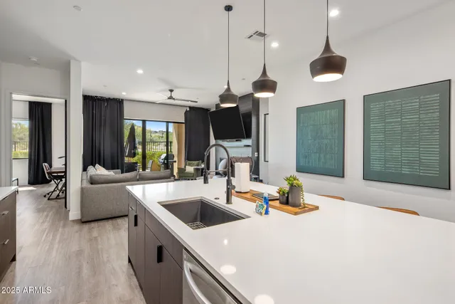 a bed room with a bed and a potted plant