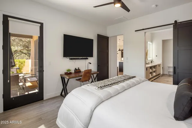 a kitchen with a dining table and chairs