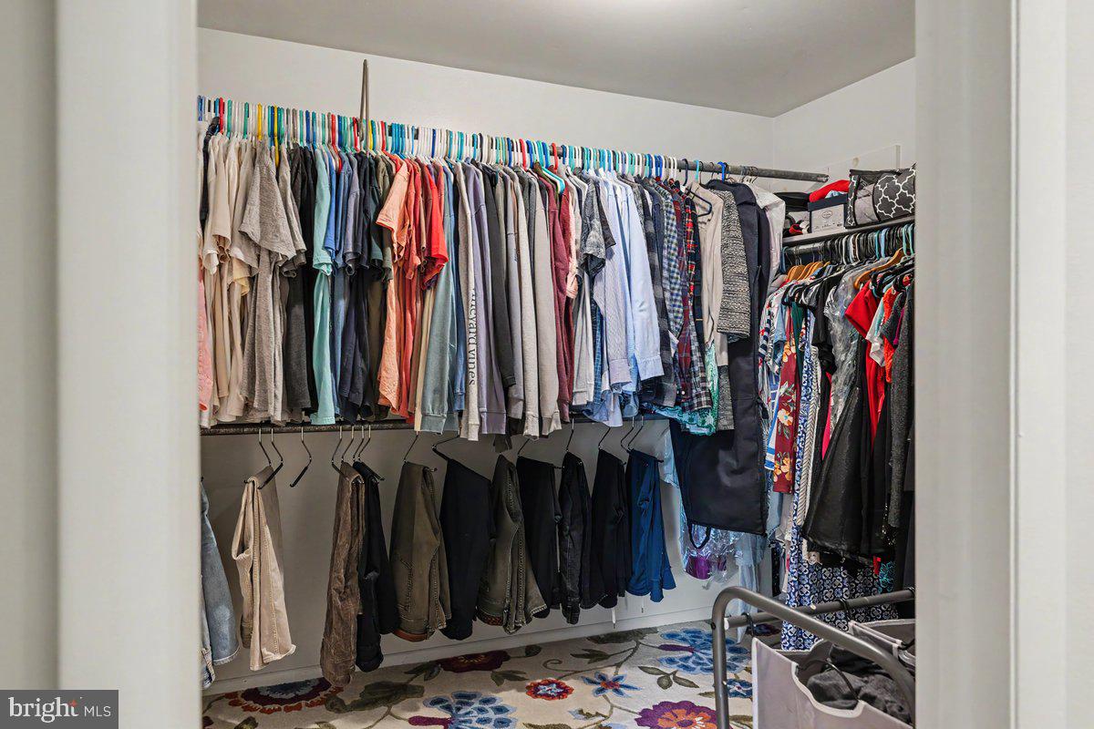 13 High Road New Hope, PA 18938 - Photo 31 of 56 a view of walk in closet with clothes
