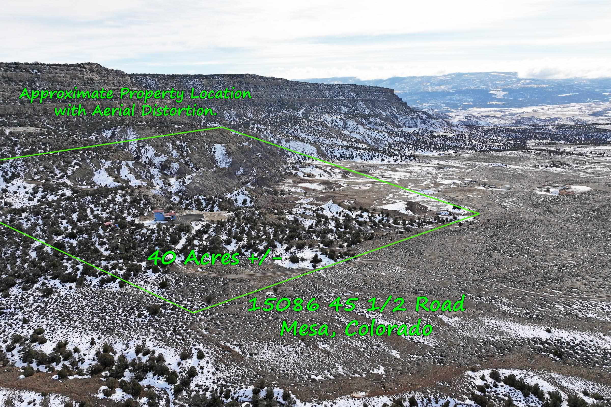 15086-45 45 1/2 Road De Beque, CO 81630 - Photo 4 of 40 a view of a large mountain with mountains in the background