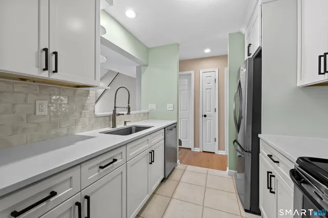 a view of an empty room with glass door