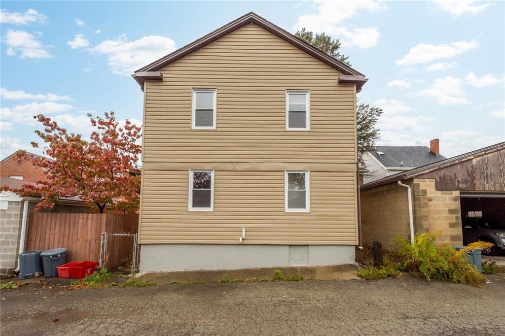 7129 Michigan Street Pittsburgh, PA 15218 - Photo 25 of 25 a view of a house with a garage