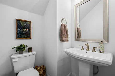 a kitchen with a sink and a window