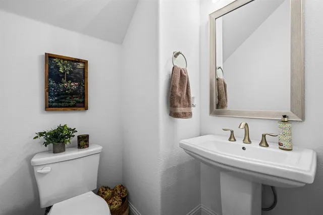 a kitchen with a sink and a window