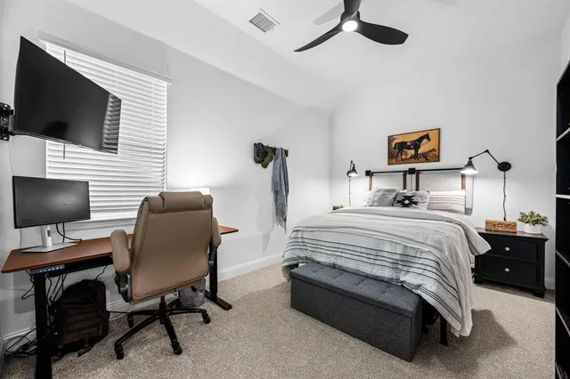 a bathroom with a sink toilet and mirror