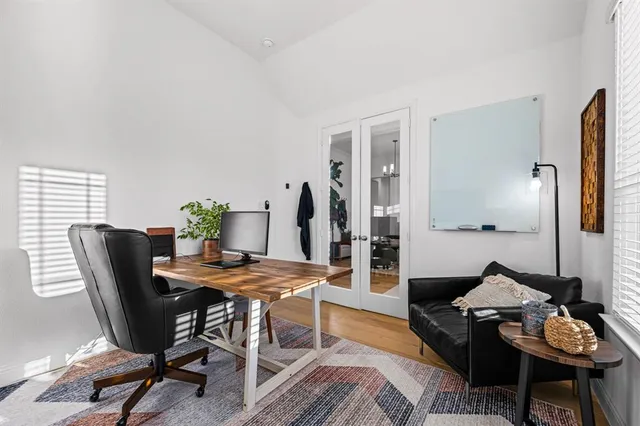 a view of a livingroom with furniture and lounge chair