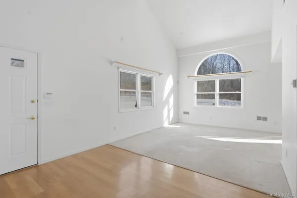 an empty room with windows