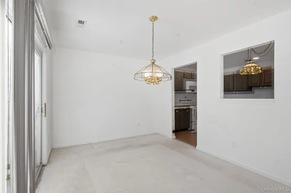 a view of a livingroom with a chandelier