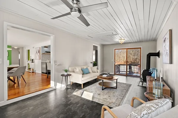 a living room with furniture and a table