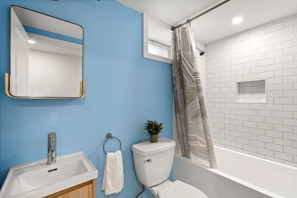 a view of hallway with washer and dryer