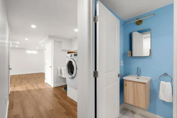a utility room with dryer and washer