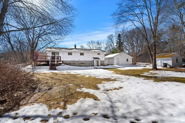 a street view with snow on the road