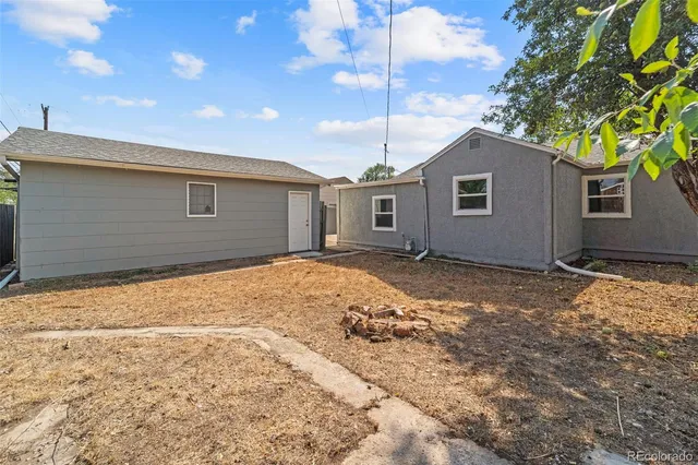 a house with yard in front of it