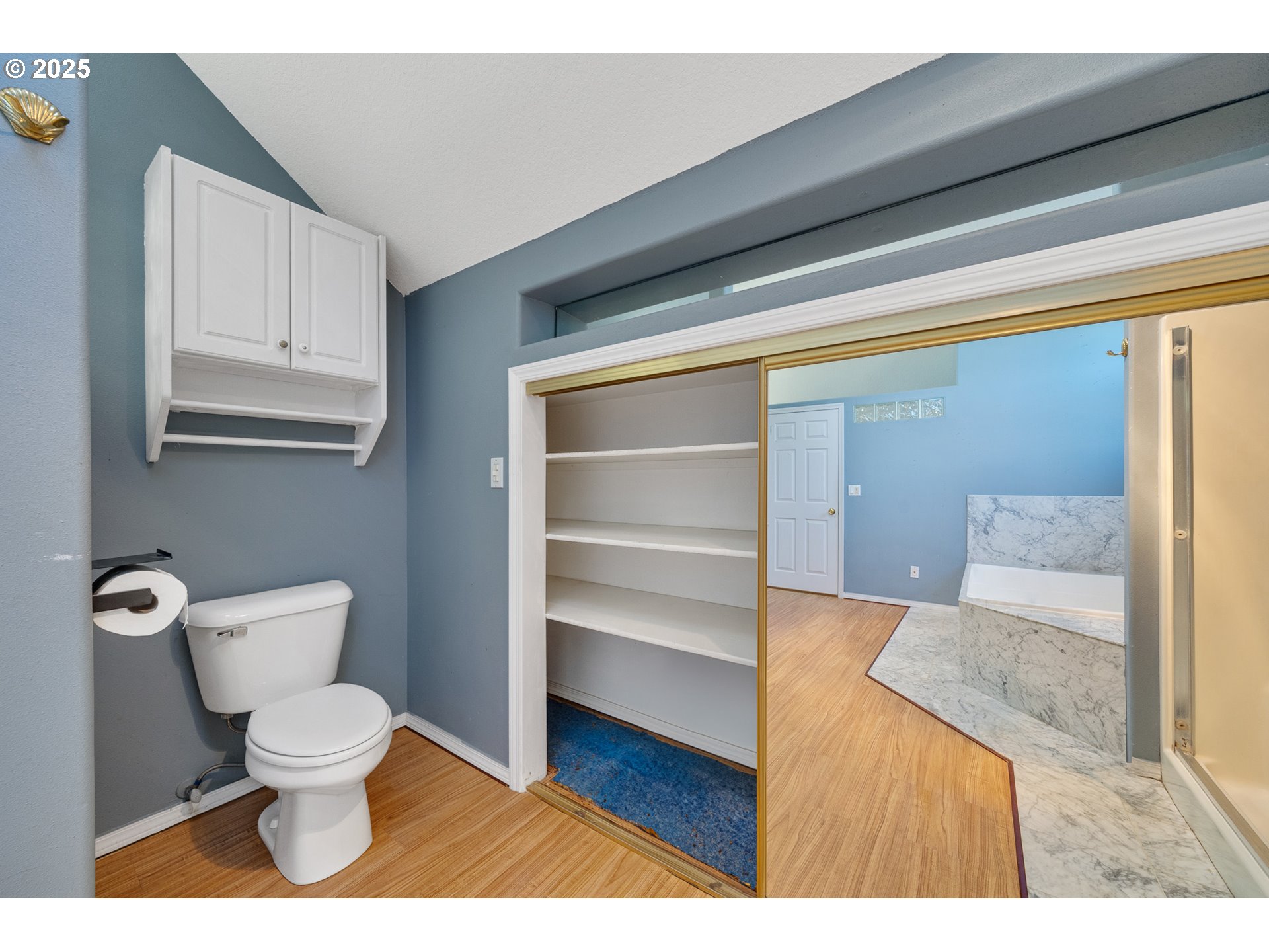4805 Leonard Street West Netarts, OR 97141 - Photo 19 of 34 a bathroom with a toilet and a rug