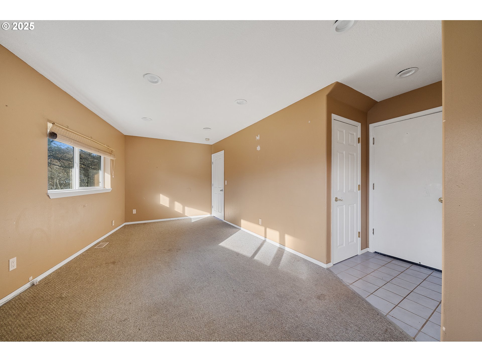 4805 Leonard Street West Netarts, OR 97141 - Photo 22 of 34 a view of an empty room with wooden floor