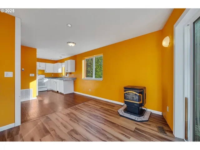 a view of a room with a large window