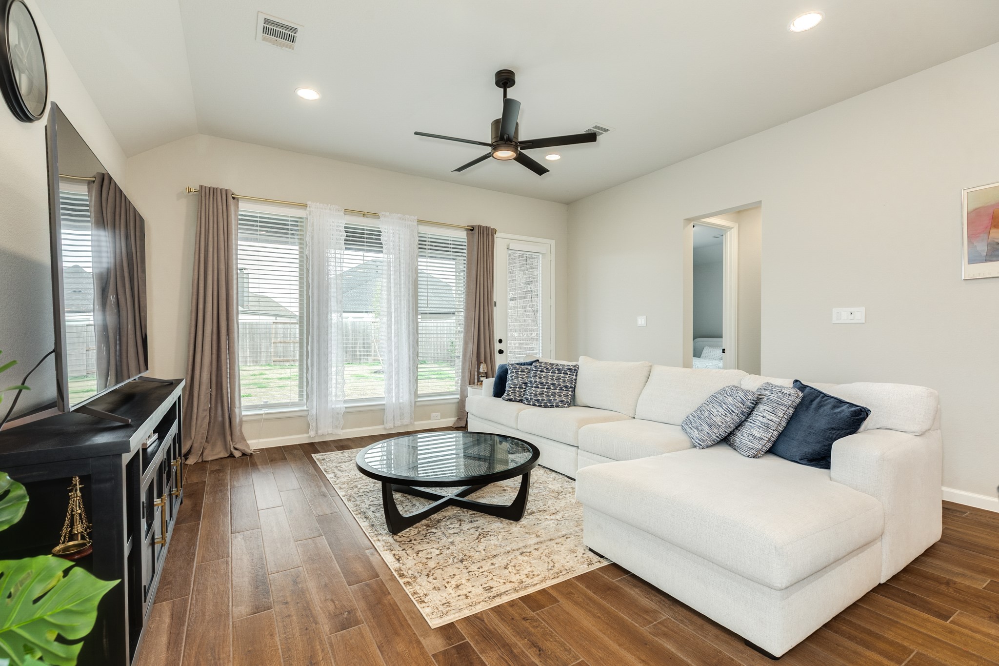 5039 Country Mdws Trail Iowa Colony, TX 77583 - Photo 13 of 50 a living room with furniture and a large window
