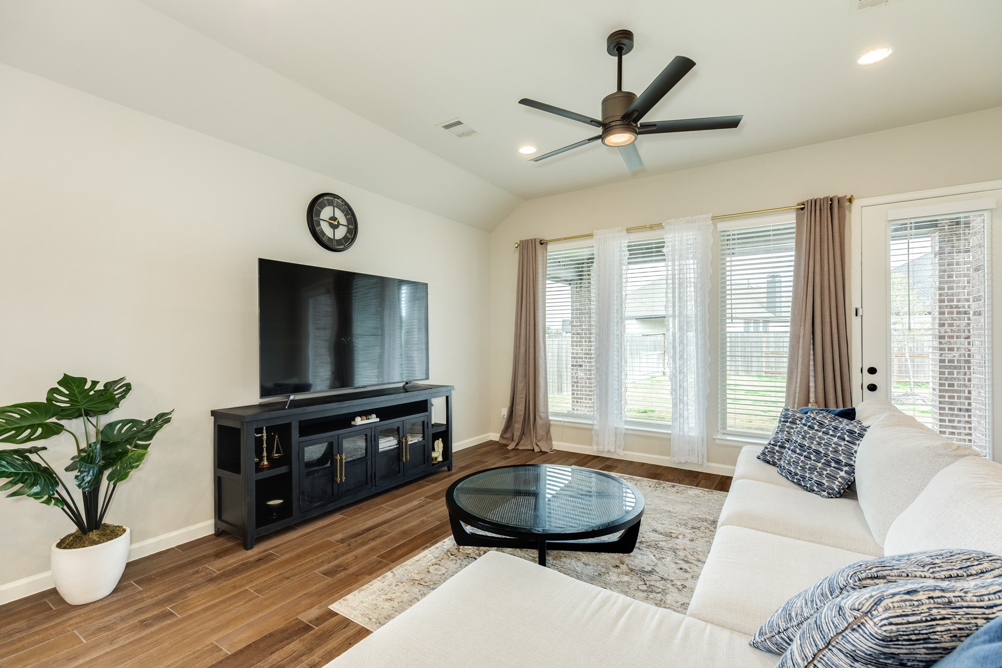 5039 Country Mdws Trail Iowa Colony, TX 77583 - Photo 15 of 50 a living room with furniture and a flat screen tv