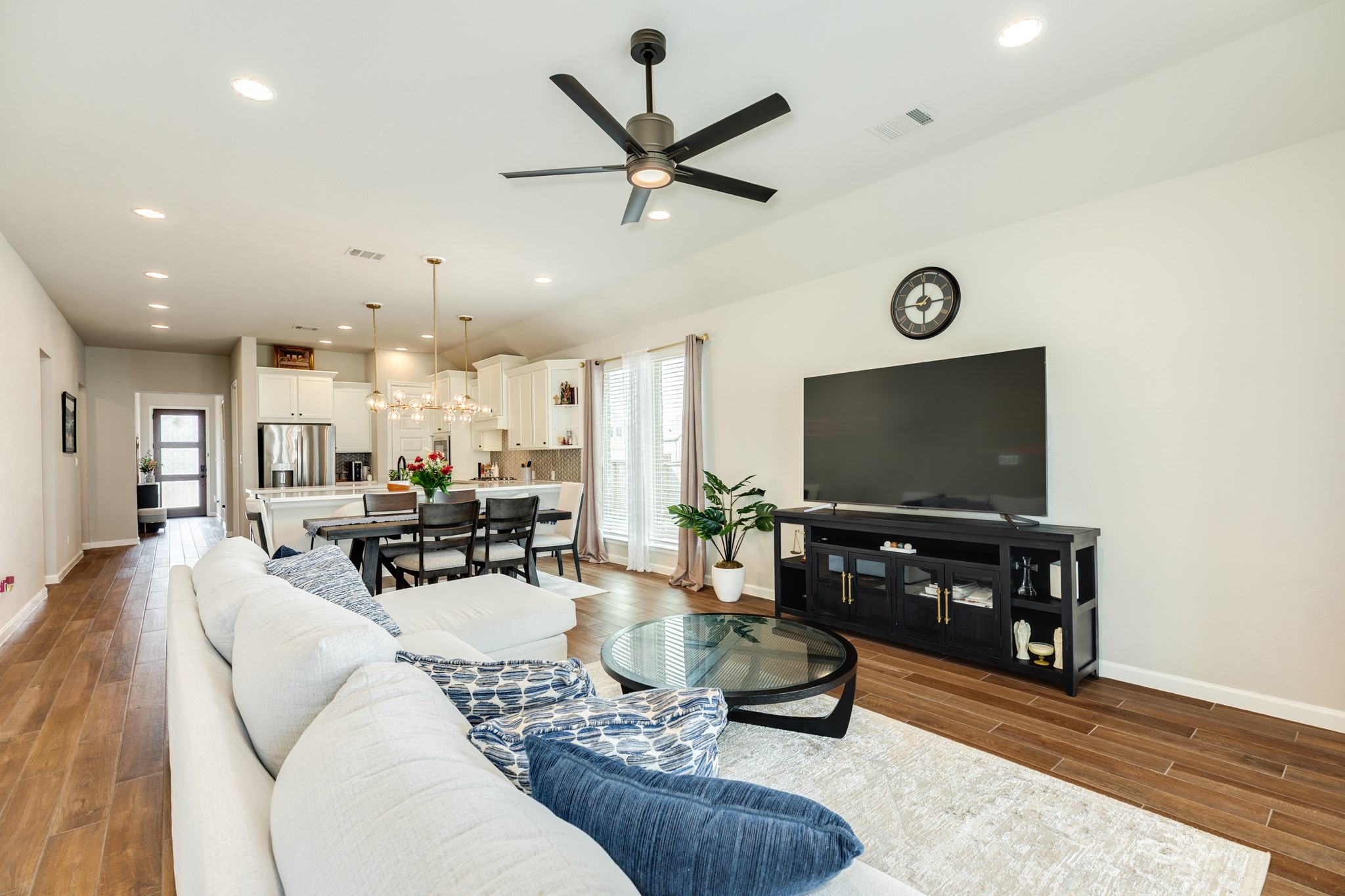 5039 Country Mdws Trail Iowa Colony, TX 77583 - Photo 50 of 50 a living room with furniture and a flat screen tv