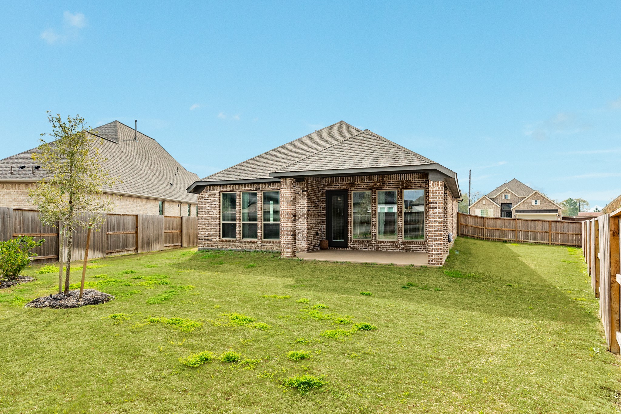 5039 Country Mdws Trail Iowa Colony, TX 77583 - Photo 24 of 50 a front view of a house with a yard
