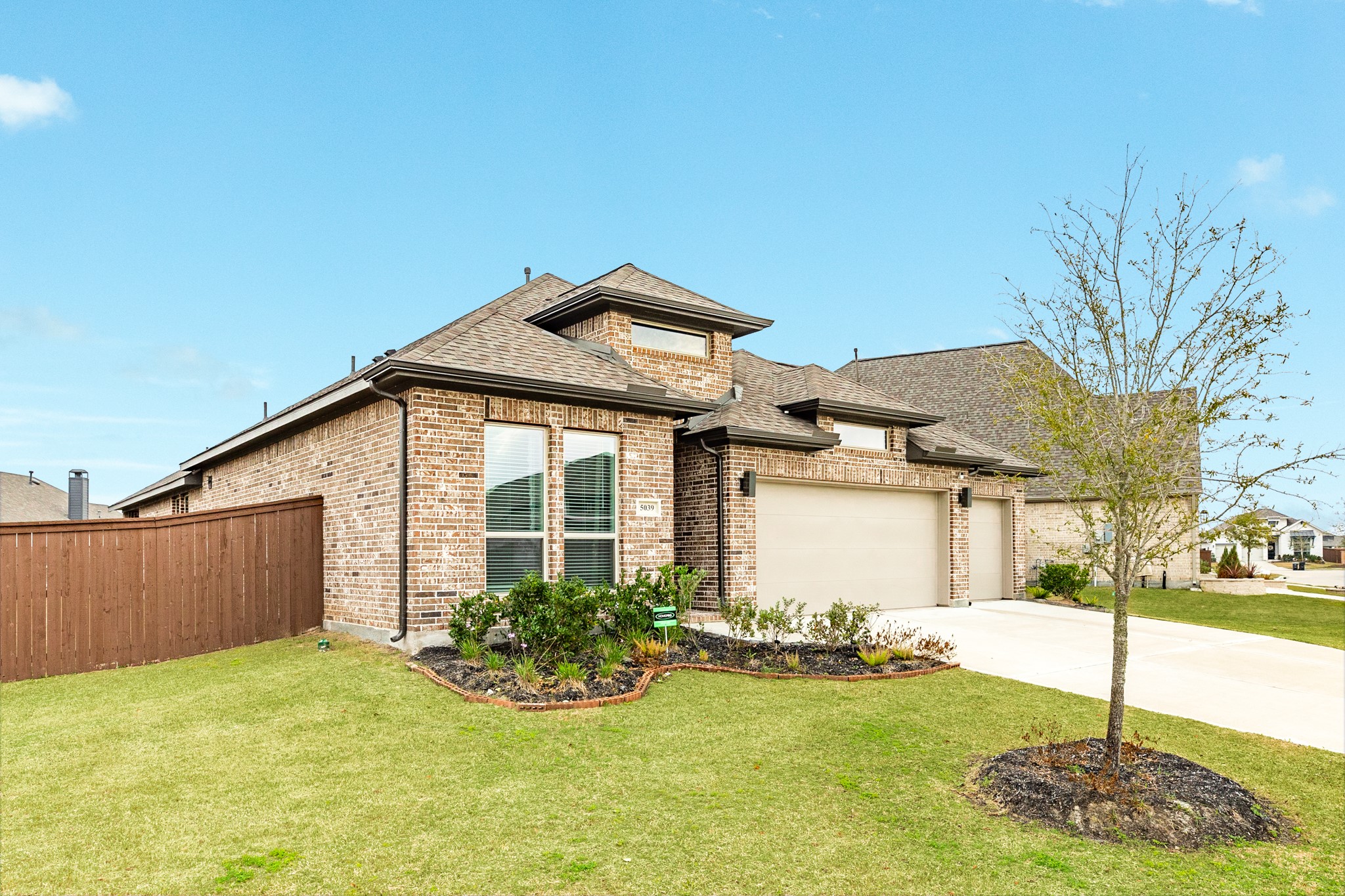 5039 Country Mdws Trail Iowa Colony, TX 77583 - Photo 36 of 50 a front view of a house with garden