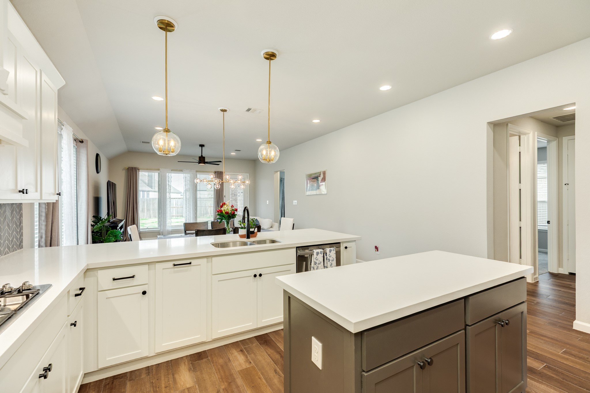 5039 Country Mdws Trail Iowa Colony, TX 77583 - Photo 9 of 50 a kitchen with a sink a counter space and a window