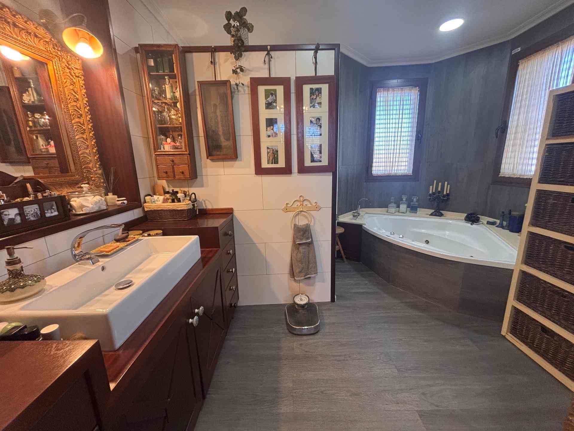 8 Carrer Del Teuladí Charlottesville, VC 46117 - Photo 15 of 30 a bathroom with a double vanity sink mirror and bathtub