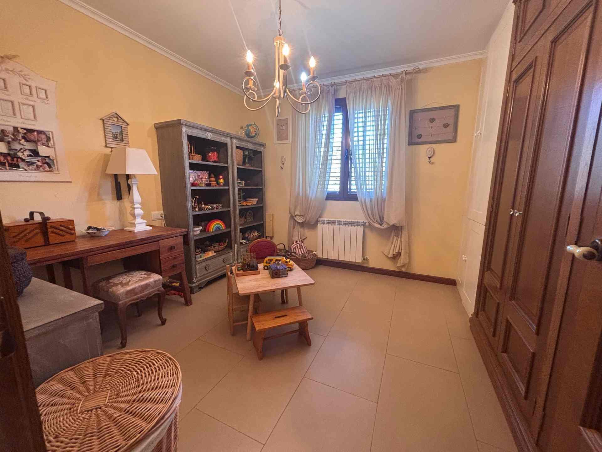 8 Carrer Del Teuladí Charlottesville, VC 46117 - Photo 17 of 30 a living room with furniture and a chandelier