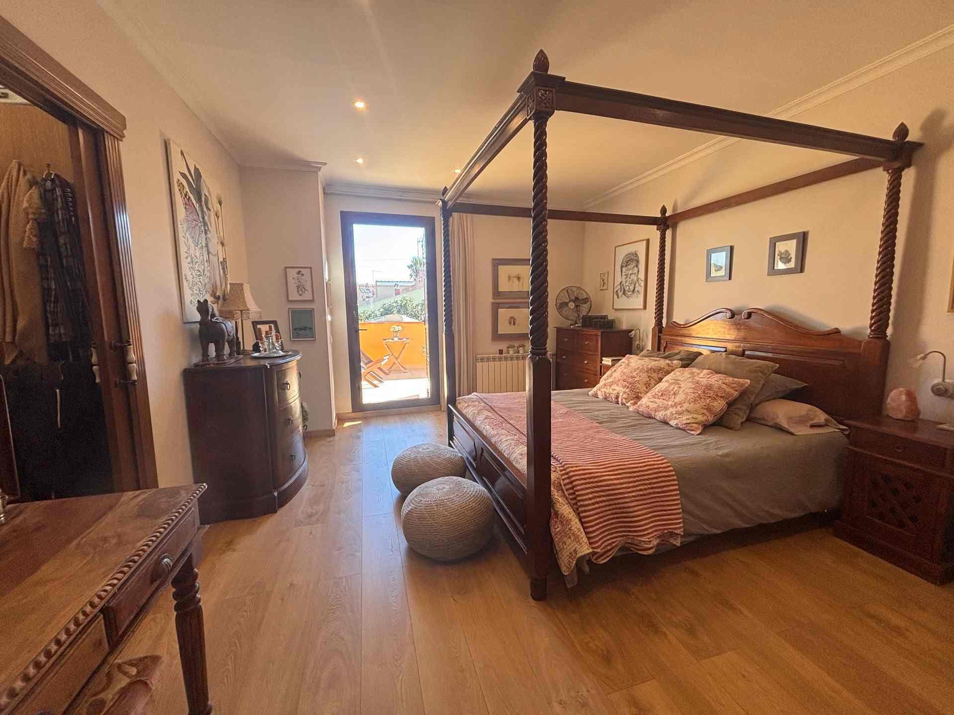 8 Carrer Del Teuladí Charlottesville, VC 46117 - Photo 18 of 30 a bedroom with a bed and large windows