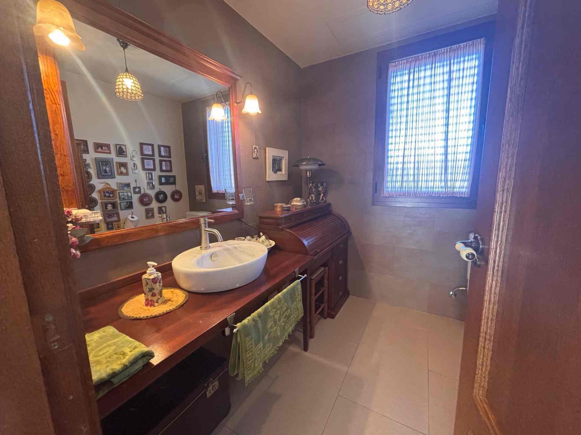 8 Carrer Del Teuladí Charlottesville, VC 46117 - Photo 23 of 30 a bathroom with a sink double vanity and a mirror