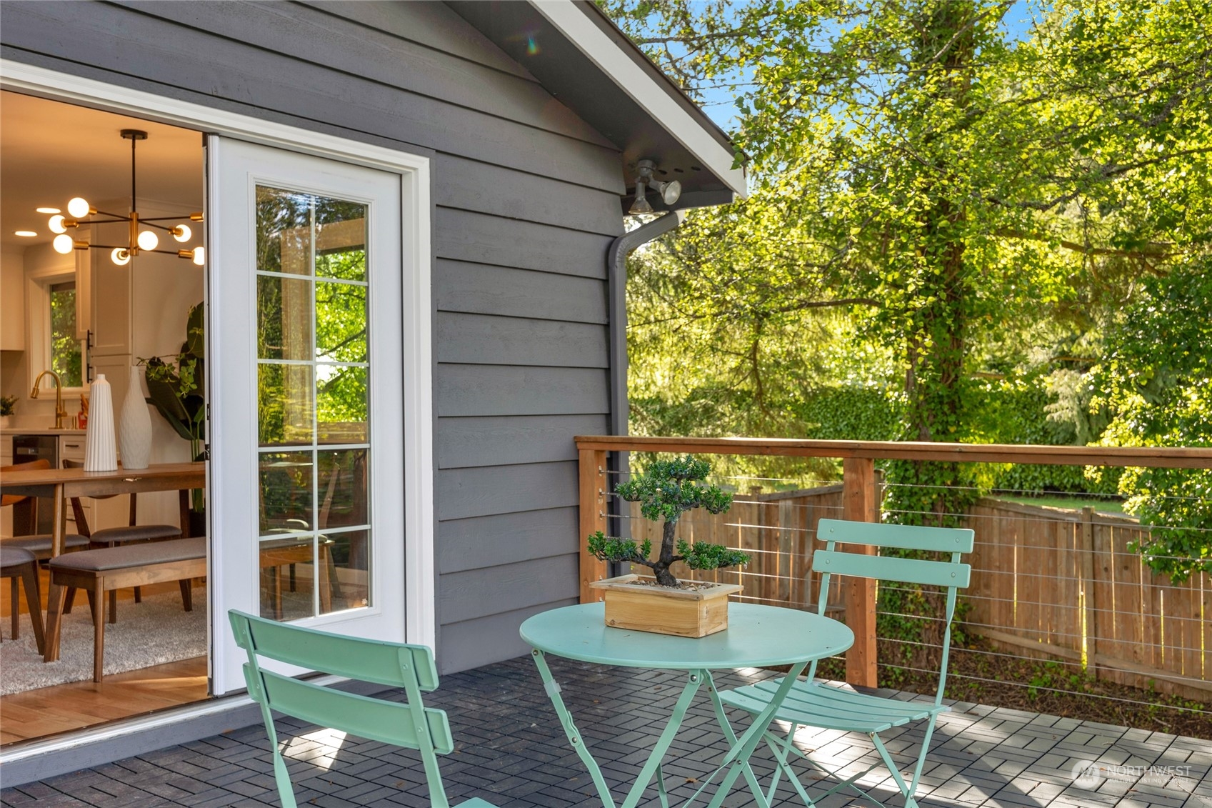 22608 23rd Place West Brier, WA 98036 - Photo 12 of 27 a view of a balcony with chairs and floor to ceiling window