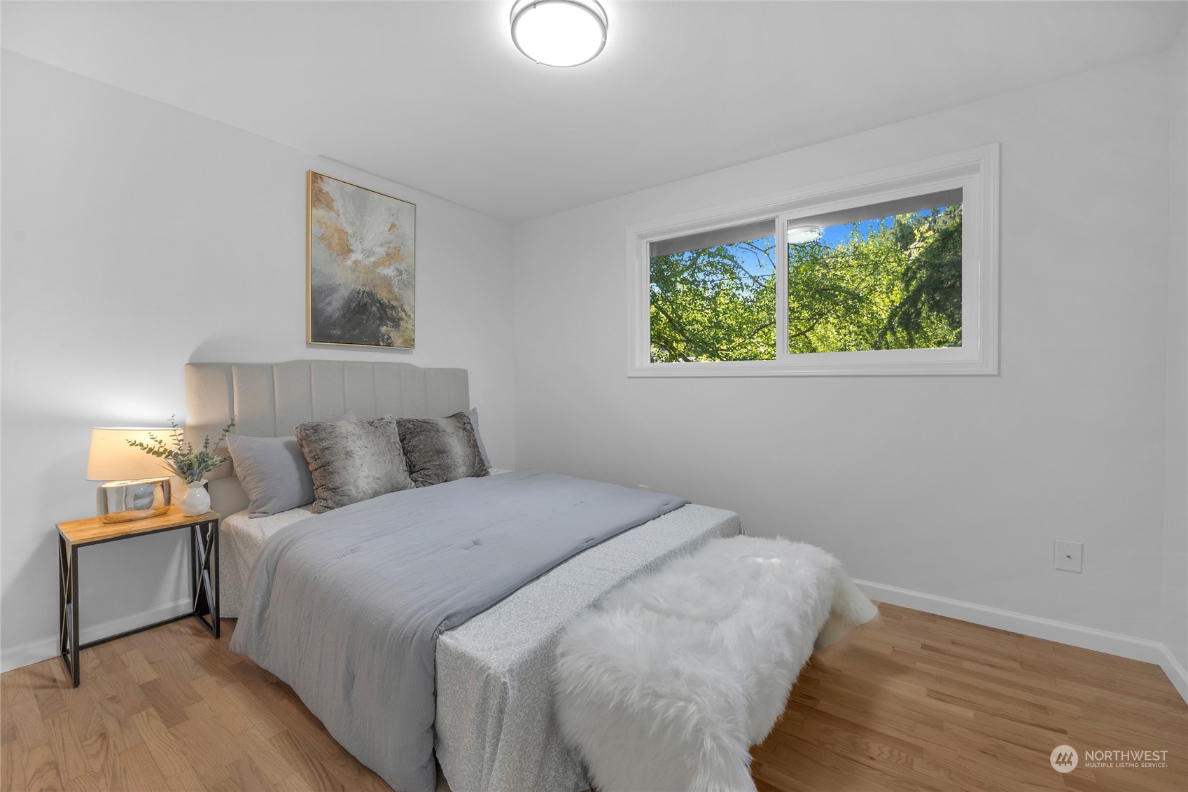 22608 23rd Place West Brier, WA 98036 - Photo 17 of 27 a bedroom with a bed and a window