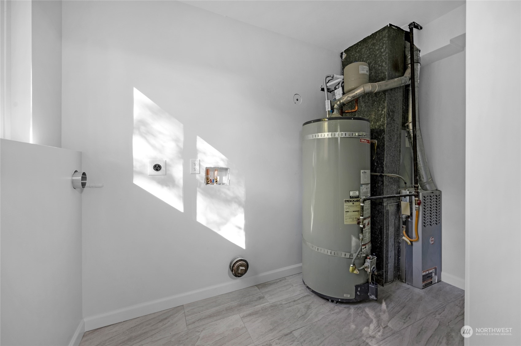 22608 23rd Place West Brier, WA 98036 - Photo 23 of 27 a view of water heater room