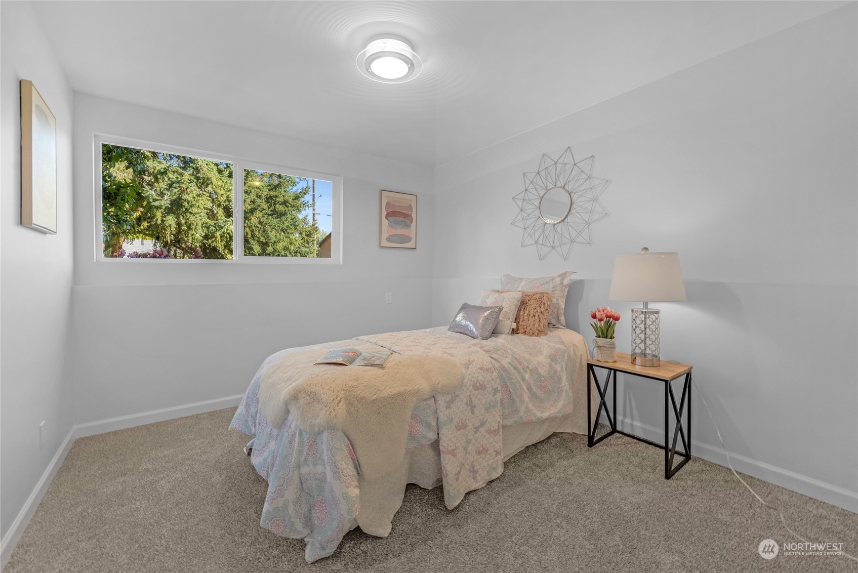 22608 23rd Place West Brier, WA 98036 - Photo 24 of 27 a bedroom with a bed and a window