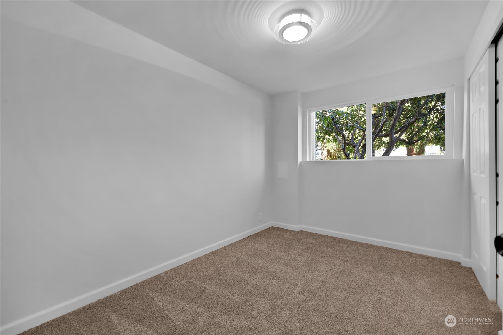 22608 23rd Place West Brier, WA 98036 - Photo 25 of 27 an empty room with windows