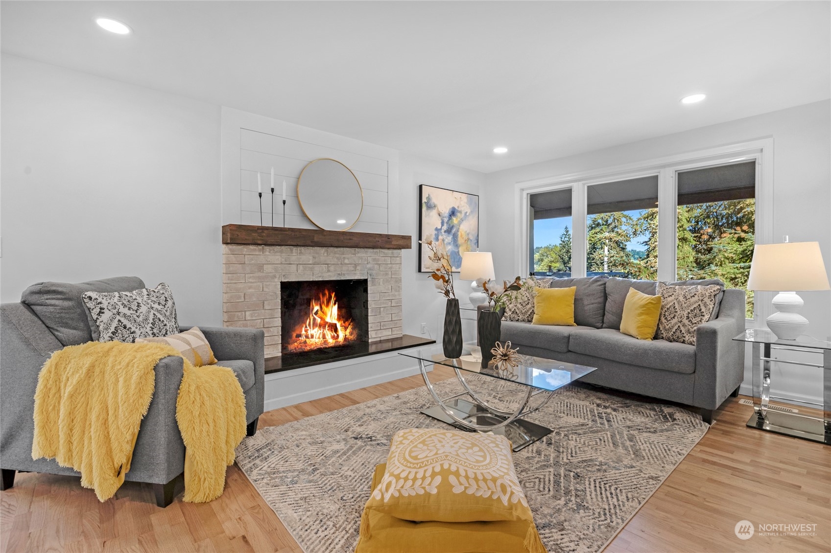 22608 23rd Place West Brier, WA 98036 - Photo 7 of 27 a living room with furniture and a fireplace