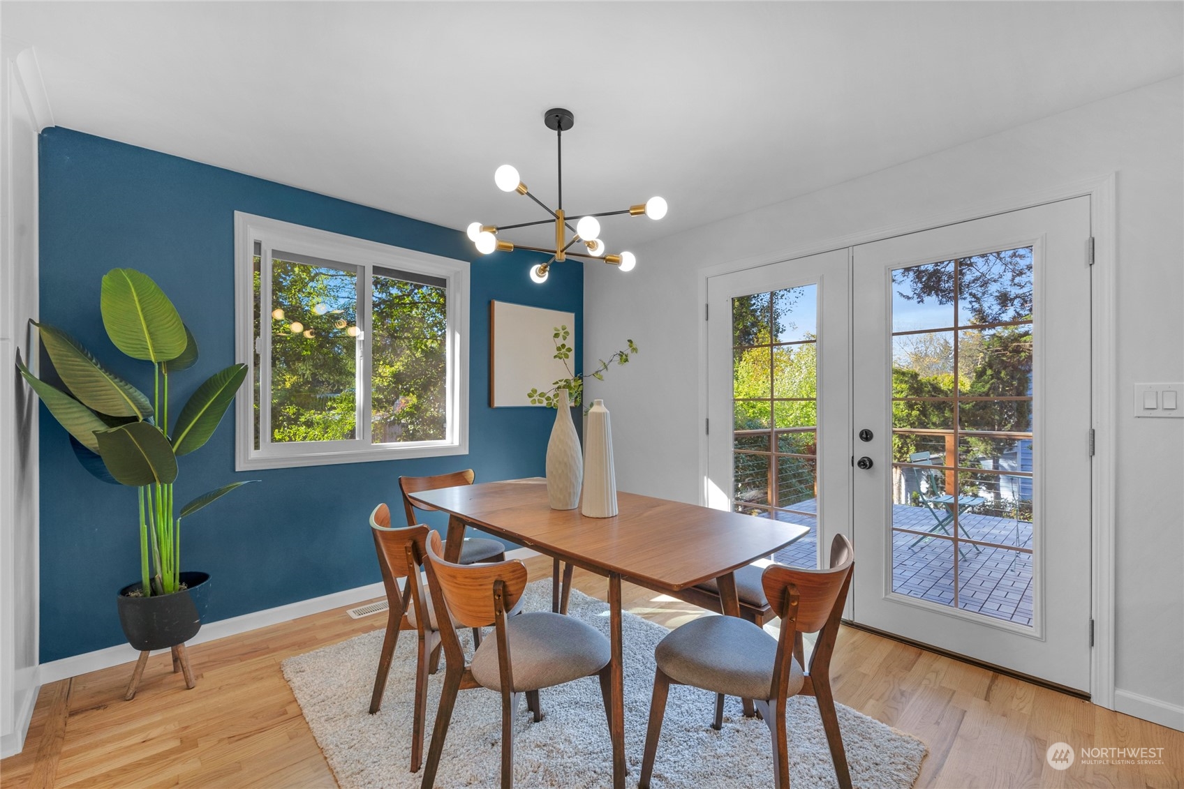 22608 23rd Place West Brier, WA 98036 - Photo 9 of 27 a view of a dining room with furniture window and wooden floor