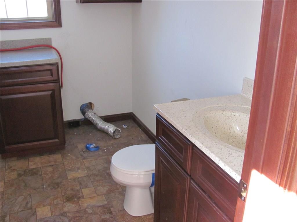 352 Thompson Road Chicora, PA 16025 - Photo 21 of 21 First floor half bath with laundry hook ups
