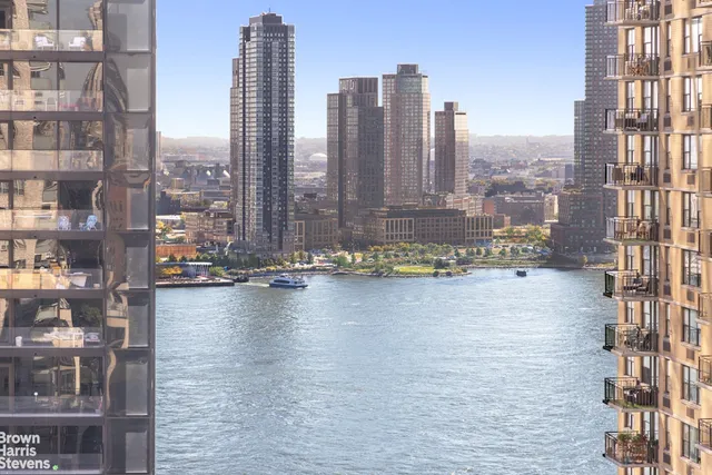 a view of a city with tall buildings