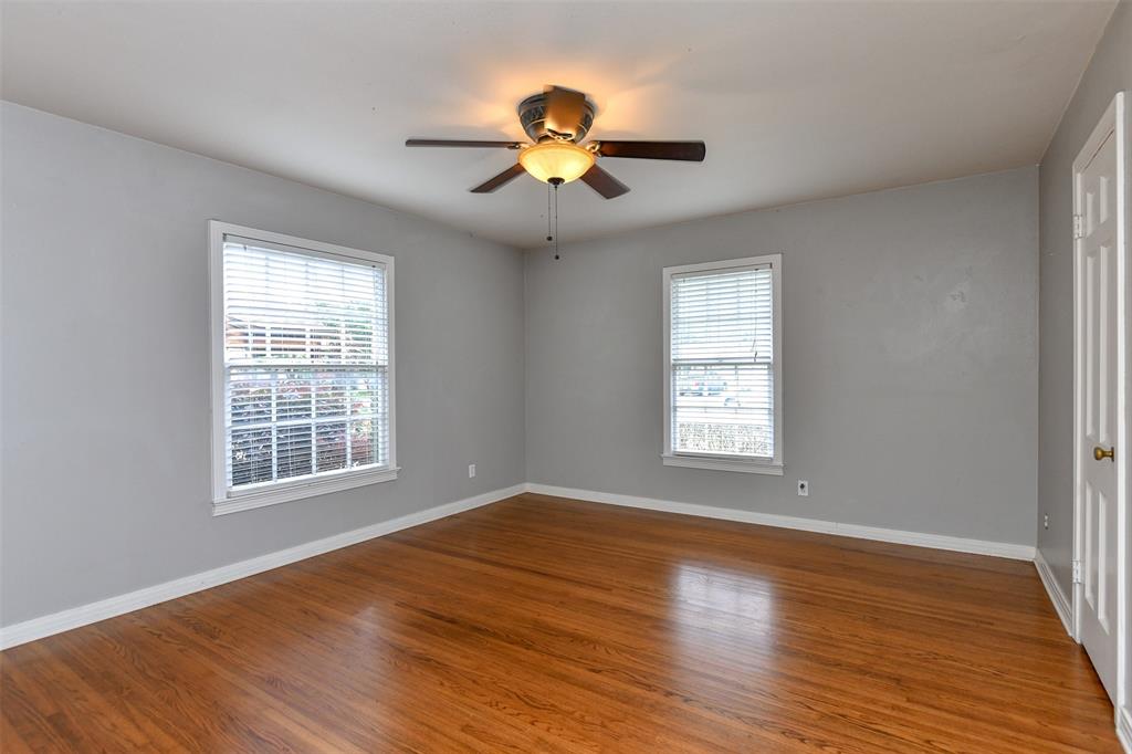 3516 Rashti Court Fort Worth, TX 76109 - Photo 15 of 24 Unfurnished room featuring hardwood / wood-style flooring and ceiling fan