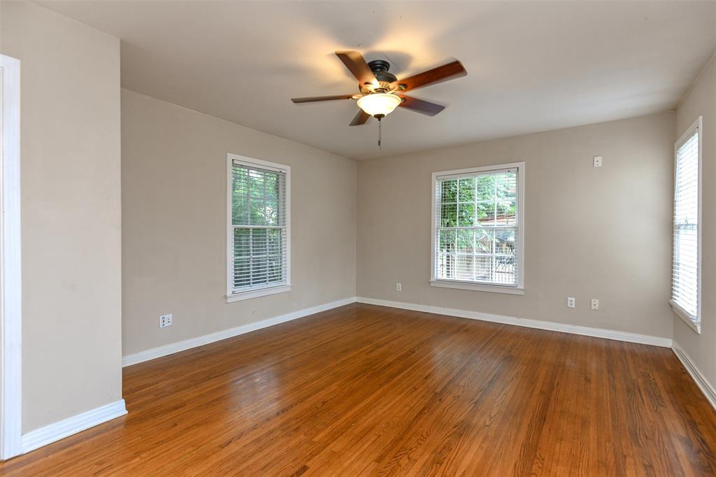 3516 Rashti Court Fort Worth, TX 76109 - Photo 17 of 24 Empty room with ceiling fan and dark hardwood / wood-style flooring