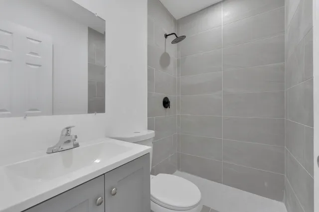 a view of a house with a small yard