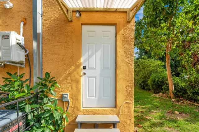 a view of a kitchen with electric appliances