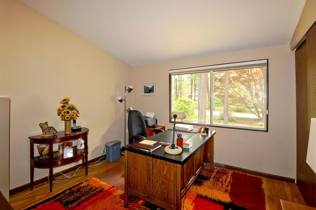 4 Holiday Road Wayland, MA 01778 - Photo 23 of 25 a room with furniture and a window