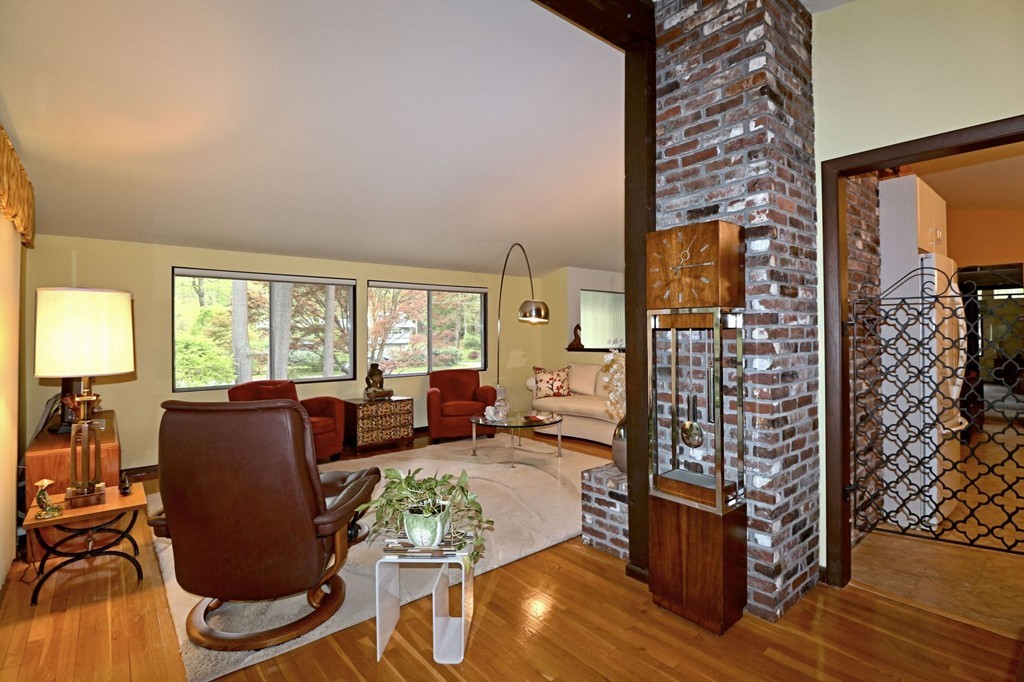4 Holiday Road Wayland, MA 01778 - Photo 9 of 25 a living room with furniture large window and wooden floor