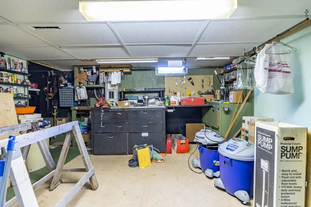 a room with lots of furniture and clutter