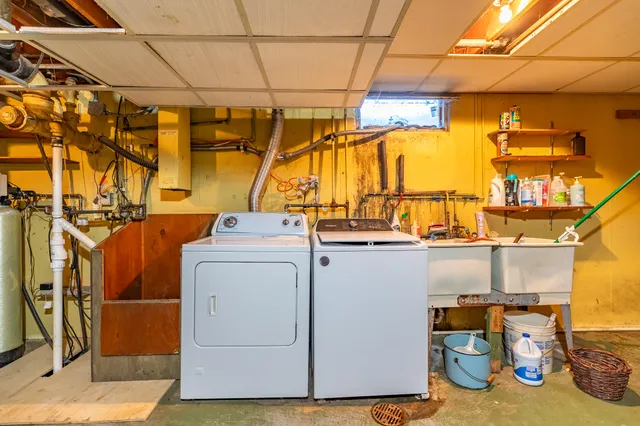 a utility room with dryer and washer