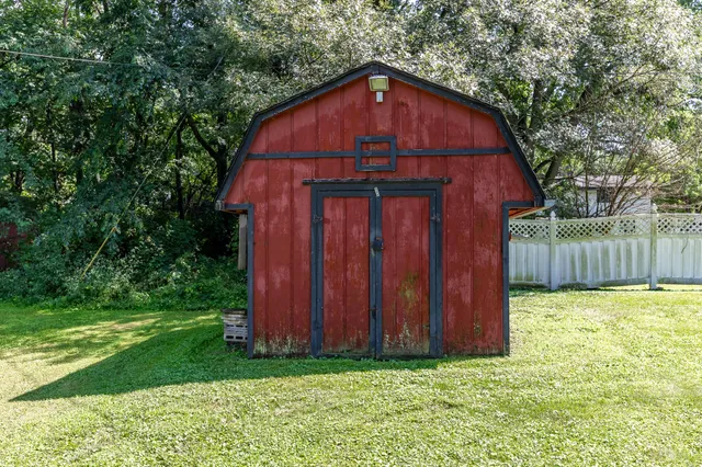 a view of backyard with green space