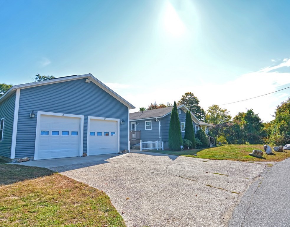 88 Rice Corner Road Brookfield, MA 01506 - Photo 1 of 39 a view of a house with a backyard