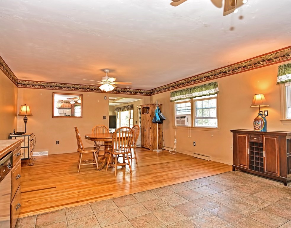 88 Rice Corner Road Brookfield, MA 01506 - Photo 11 of 39 a view of a dining room with furniture window and wooden floor